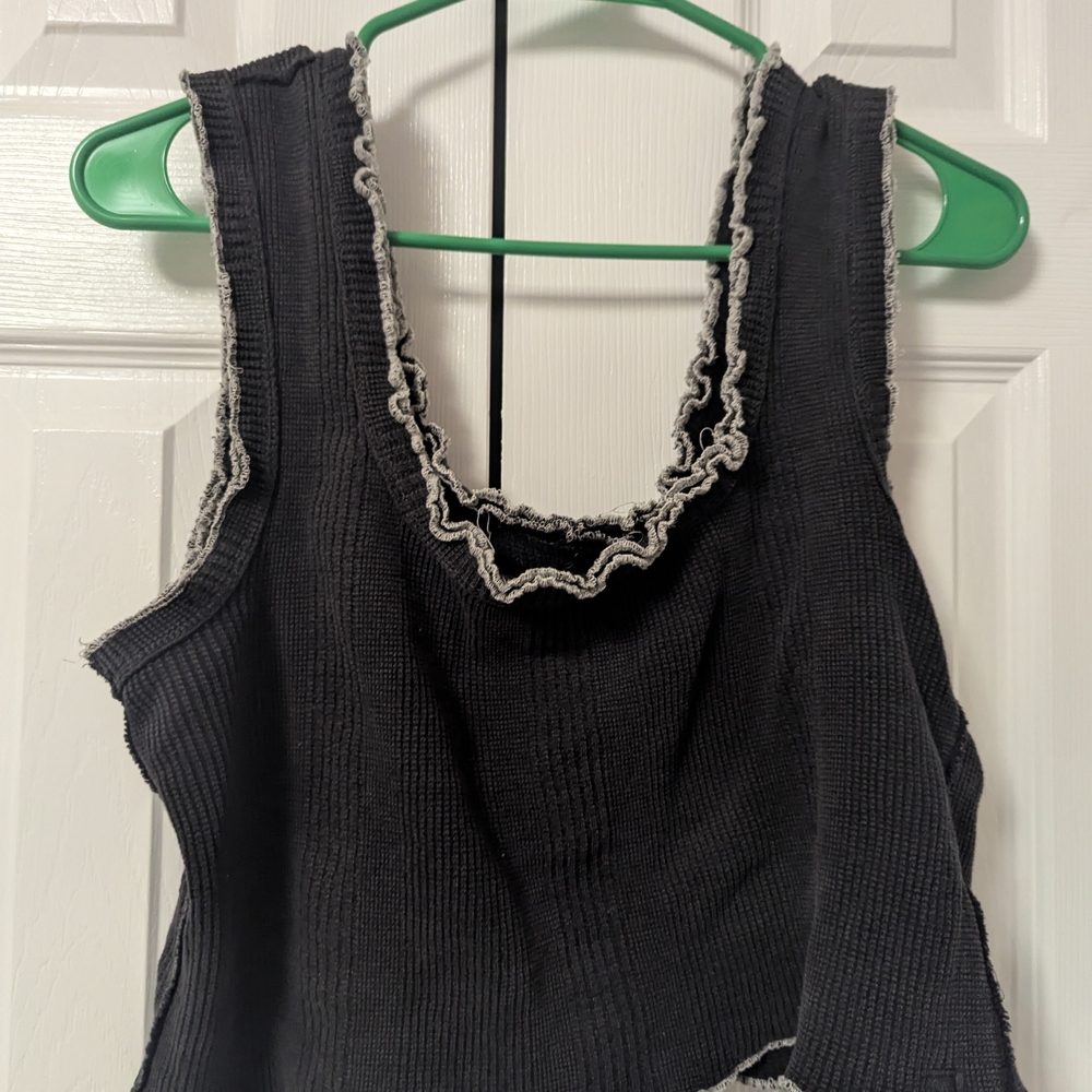 Black Sleeveless Top with Ruffle Trim